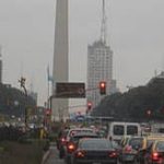 Argentina's Debt Crisis 2014 - Holding Up after Holding Out Photo showing busy street in Buenos Aires