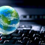 Picture of a globe on a keyboard to visualise the topic of the post