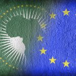 EU-AU Summit 2022 – Europe’s Struggle for Influence in Africa The African Union and the EU, flags painted on cracked concrete; Die Afrikanische Union und die EU, auf rissigen Beton gemalte Flaggen Bestellt am 07.07.2021 in einer KONZERN-Lizenz für ST-IB ID-1271 | Webbild für "Faire Migrationsaußenpolitik" D, EU, Afrikanische Union